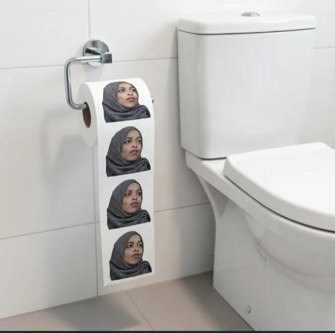 Toilet paper roll with multiple printed faces of a woman wearing a hijab.