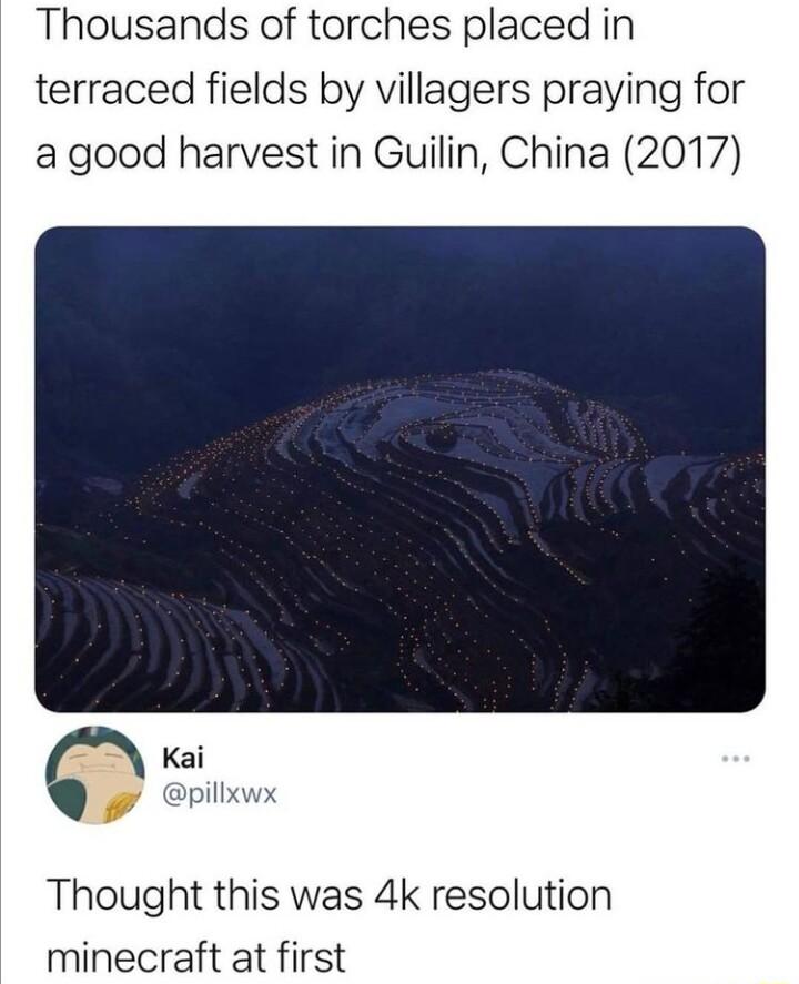 Thousands of torches placed in terraced fields by villagers praying for agood harvest in Guilin China 2017 Kai pillxwx Thought this was 4k resolution minecraft at first