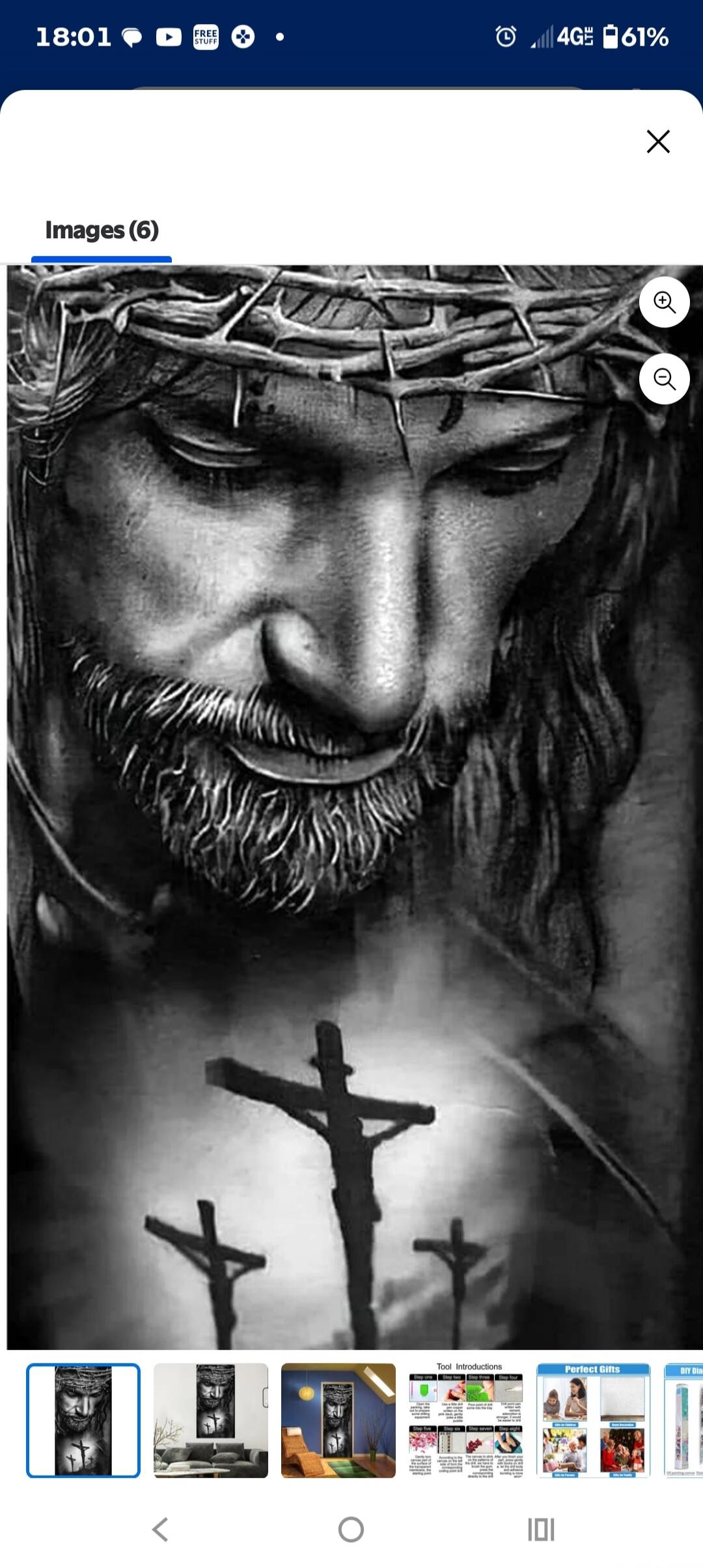 A black and white artistic depiction of Jesus Christ wearing a crown of thorns, with his eyes closed and a solemn expression. Below, three crosses are visible on a hill, symbolizing the crucifixion.