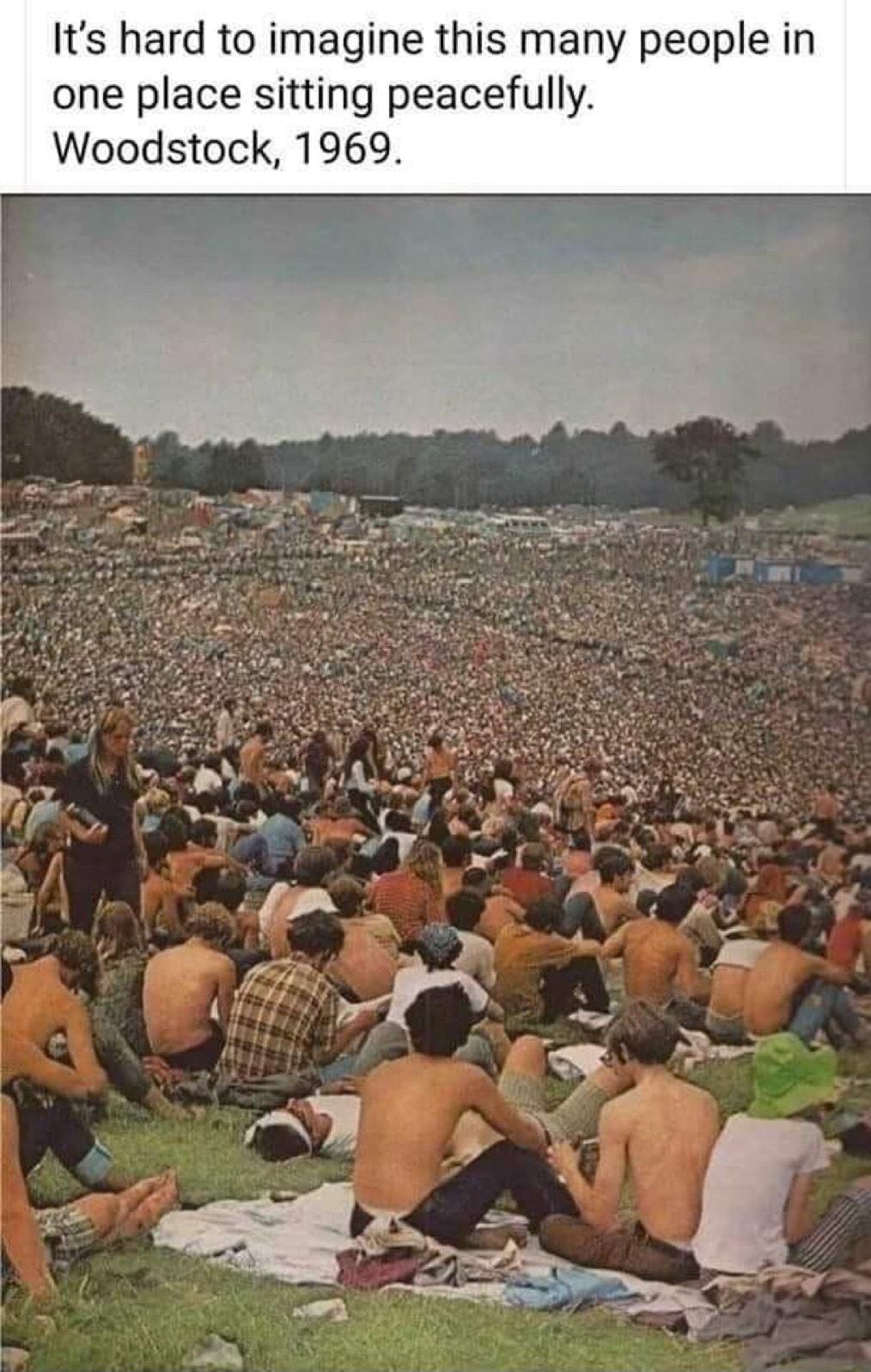 Its hard to imagine this many people in one place sitting peacefully Woodstock 1969