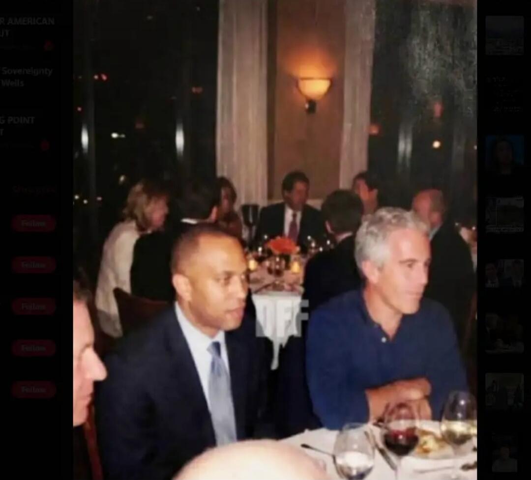 Session ID: 1087875. Group of adults seated at a dinner table in a restaurant.