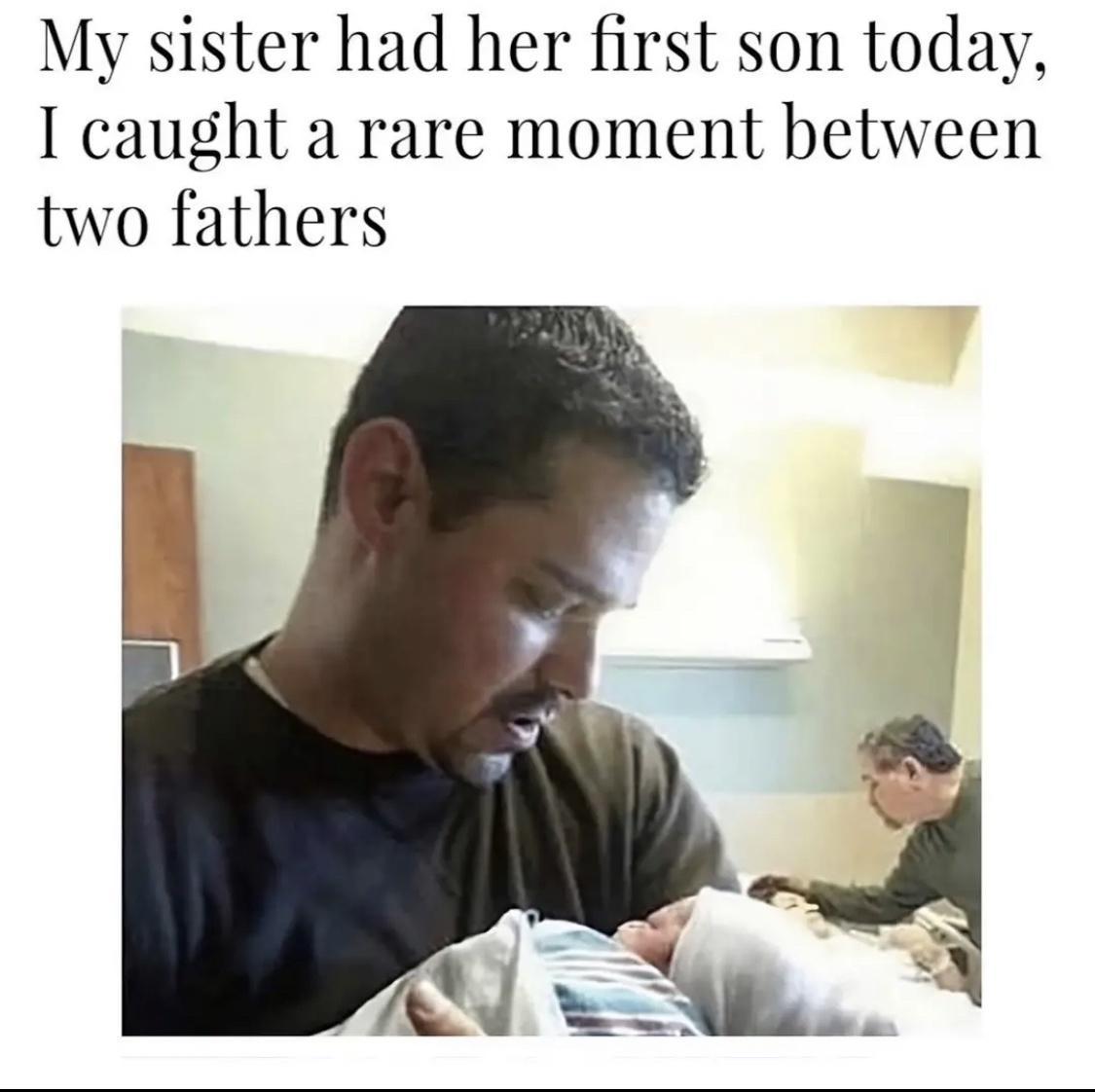 My sister had her first son today caught a rare moment between two fathers
