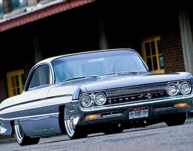 LOWRIDER. License plate unreadable.