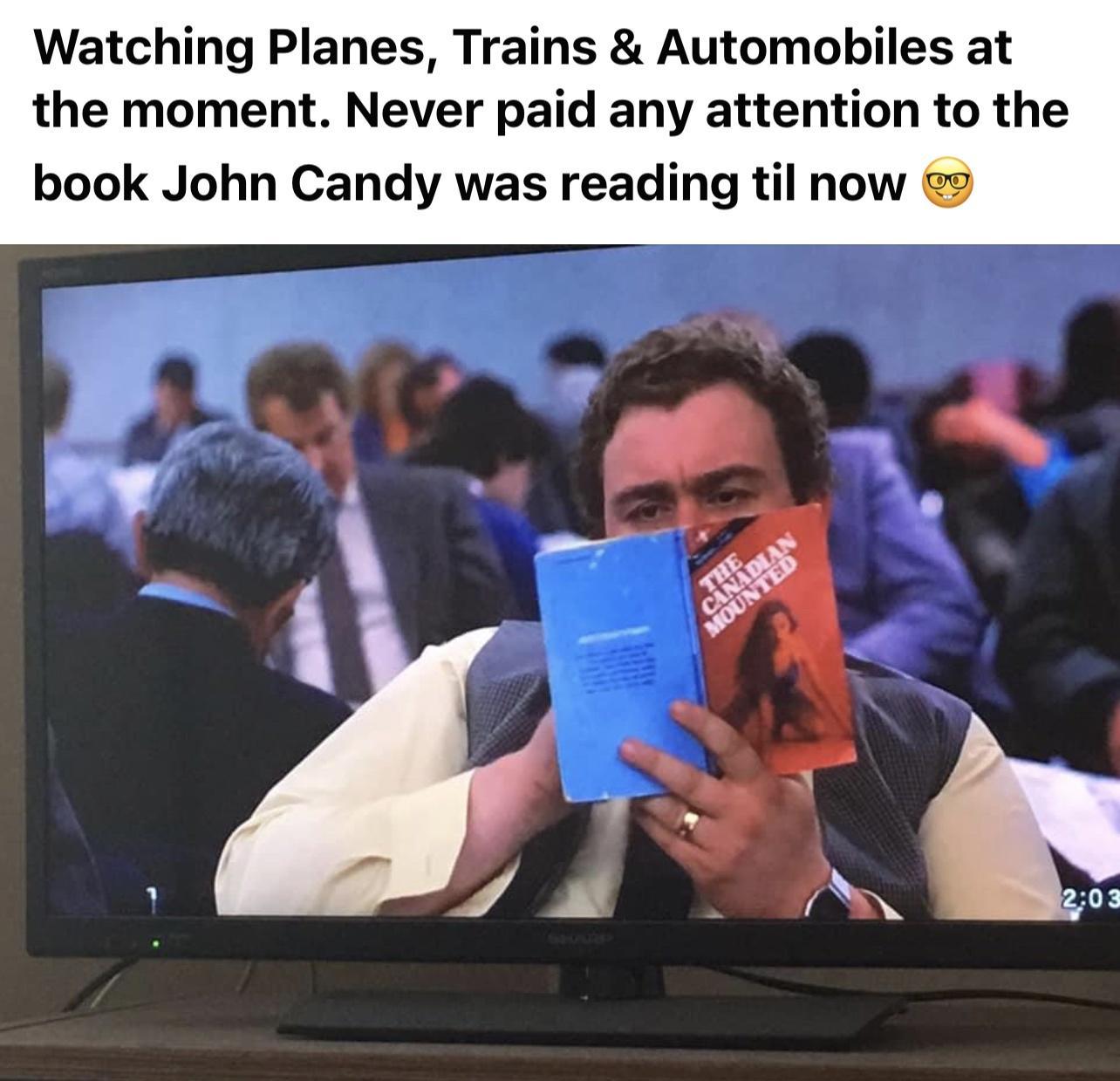 Watching Planes Trains Automobiles at the moment Never paid any attention to the book John Candy was reading til now