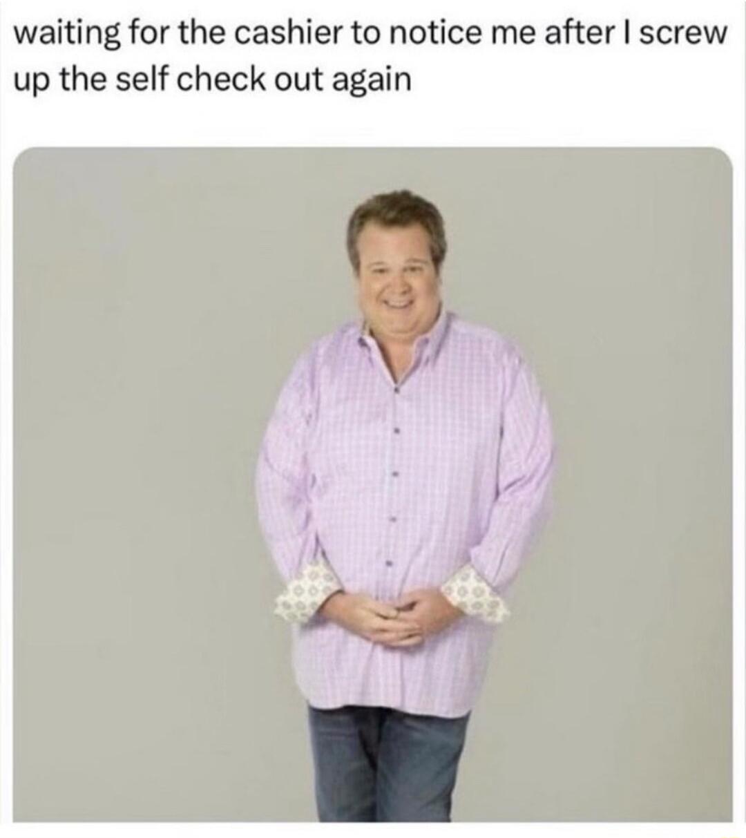 waiting for the cashier to notice me after screw up the self check out again