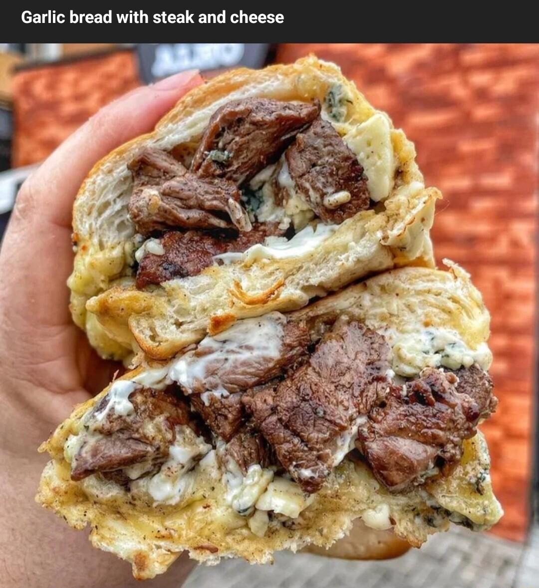 Garlic bread with steak and cheese