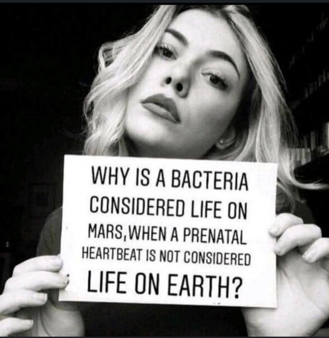 WHY IS A BACTERIA CONSIDERED LIFE ON MARS, WHEN A PRENATAL HEARTBEAT IS NOT CONSIDERED LIFE ON EARTH?