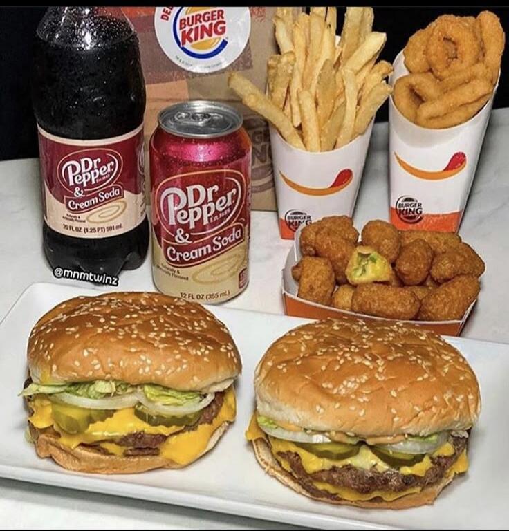 Dr. Pepper & Cream Soda, Burger King, @mnmtwinz. A fast-food meal with two burgers, french fries, onion rings, and fried cheese bites.