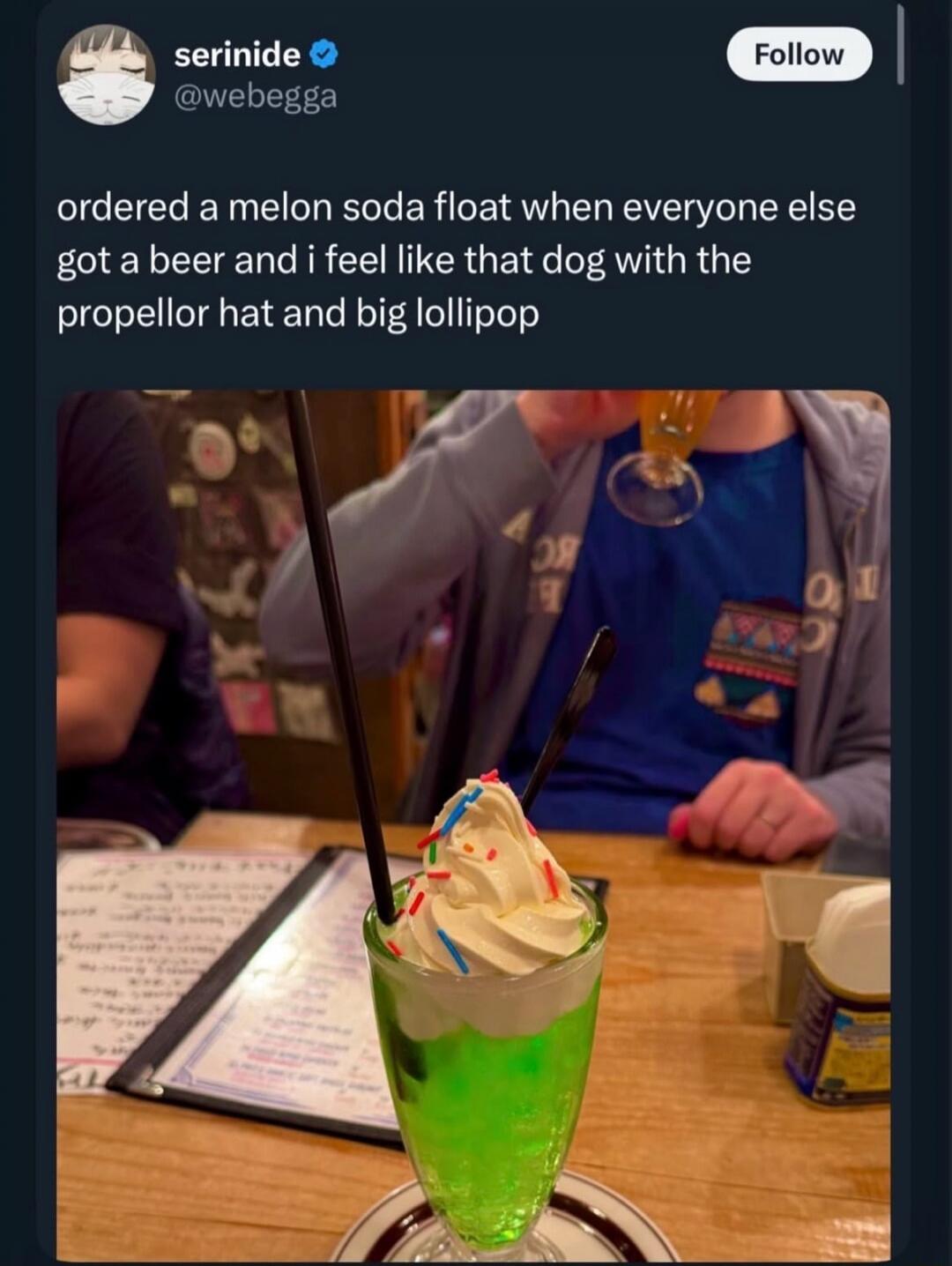 ordered a melon soda float when everyone else got a beer and i feel like that dog with the propellor hat and big lollipop