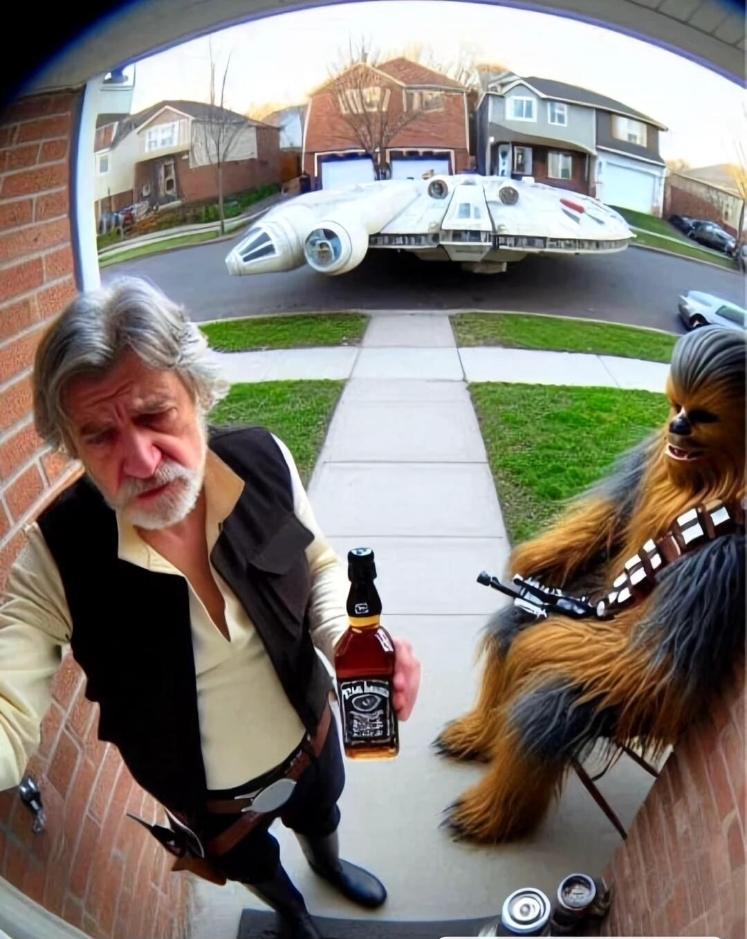 A man in a Han Solo-inspired costume stands at a doorway holding a bottle of whiskey. Beside him is a Chewbacca figure playing a guitar, with a futuristic-looking spaceship parked in the driveway of a suburban street.