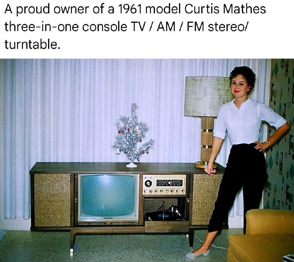 A proud owner of a 1961 model Curtis Mathes three-in-one console TV / AM / FM stereo/ turntable.