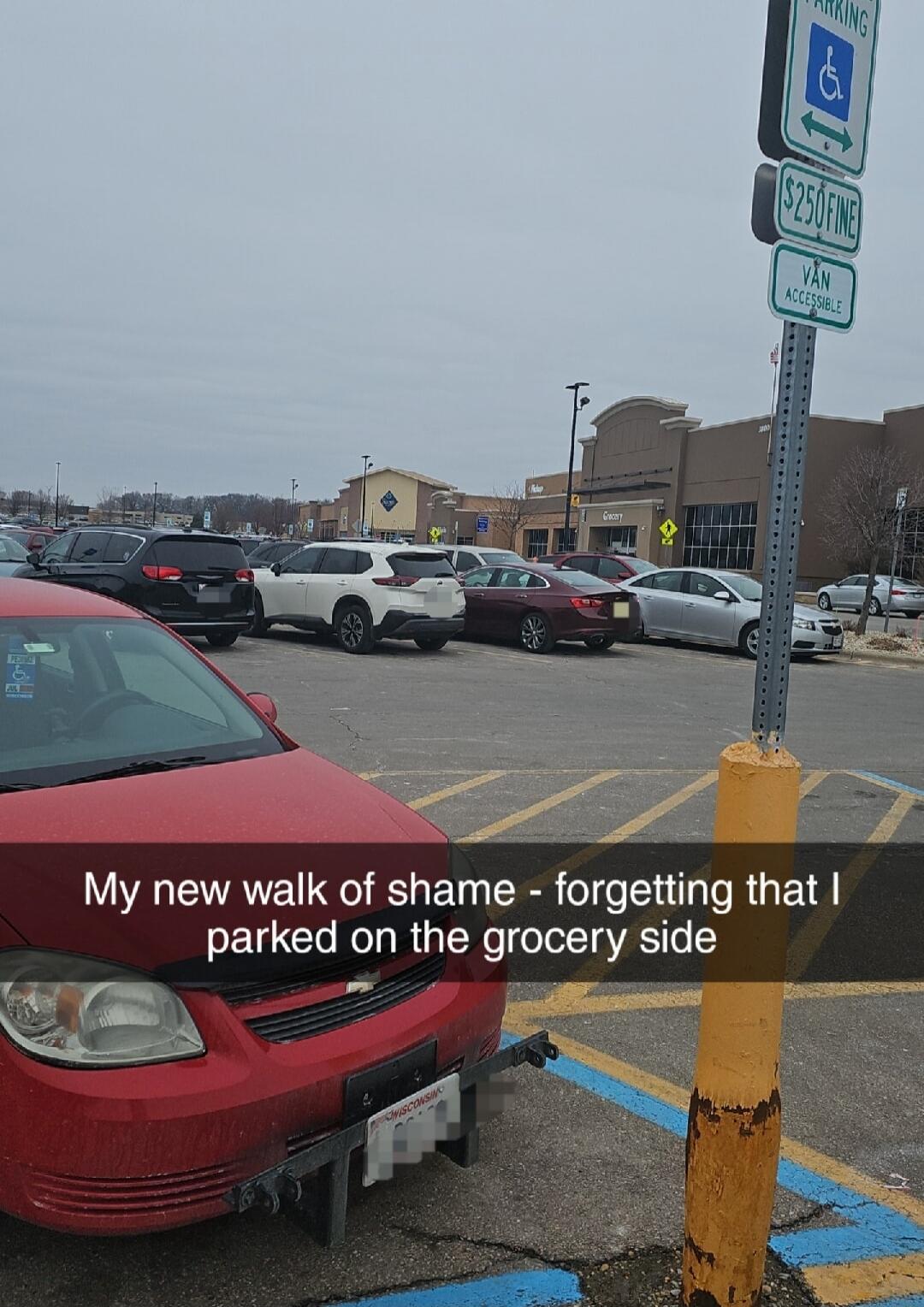 My new walk of shame - forgetting that I parked on the grocery side. PARKING. ACCESSIBLE. $250 FINE. VAN ACCESSIBLE. Grocery.
