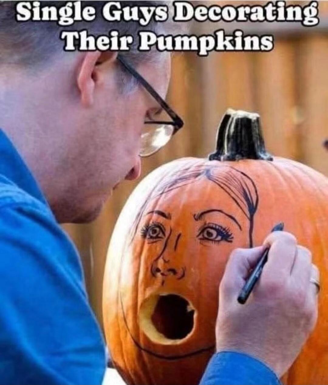 Single Guys Decorating Their Pumpkins
