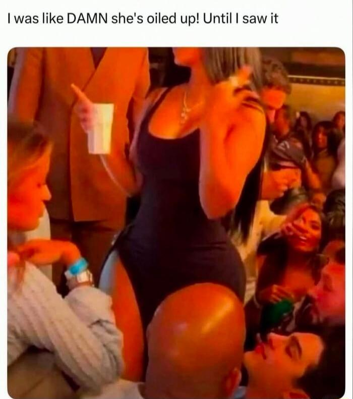 I was like DAMN she's oiled up! Until I saw it