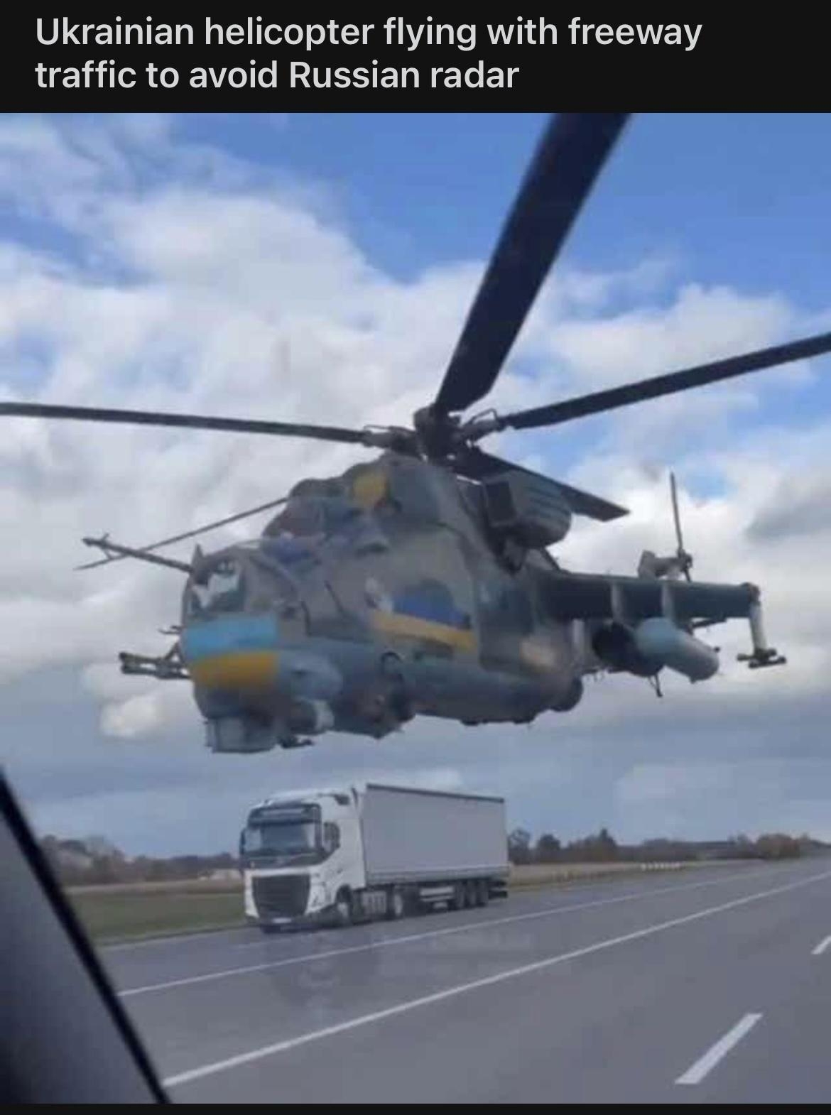 Ukrainian helicopter flying with freeway e T L ENEL T EL Bl