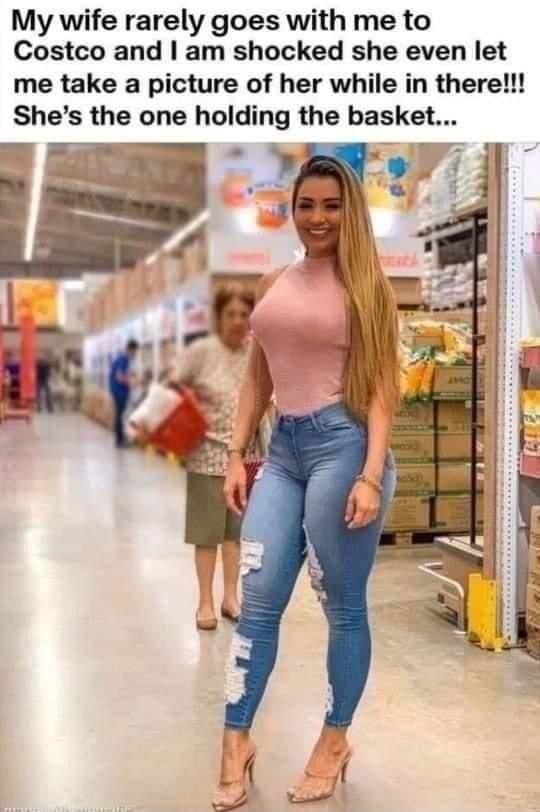 My wife rarely goes with me to Costco and am shocked she even let me take a picture of her while in there Shes the one holding the basket