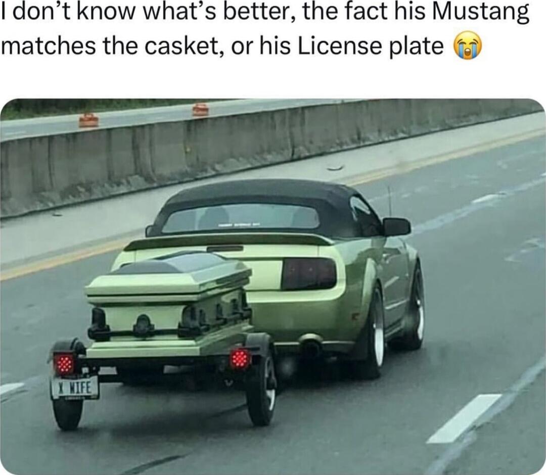 I dont know whats better the fact his Mustang matches the casket or his License plate