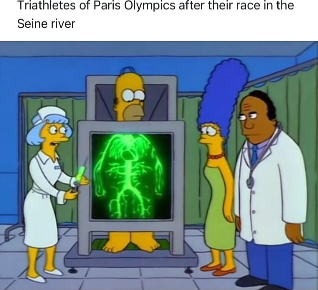 Trathletes of Paris Olympics after their race in the Seine river