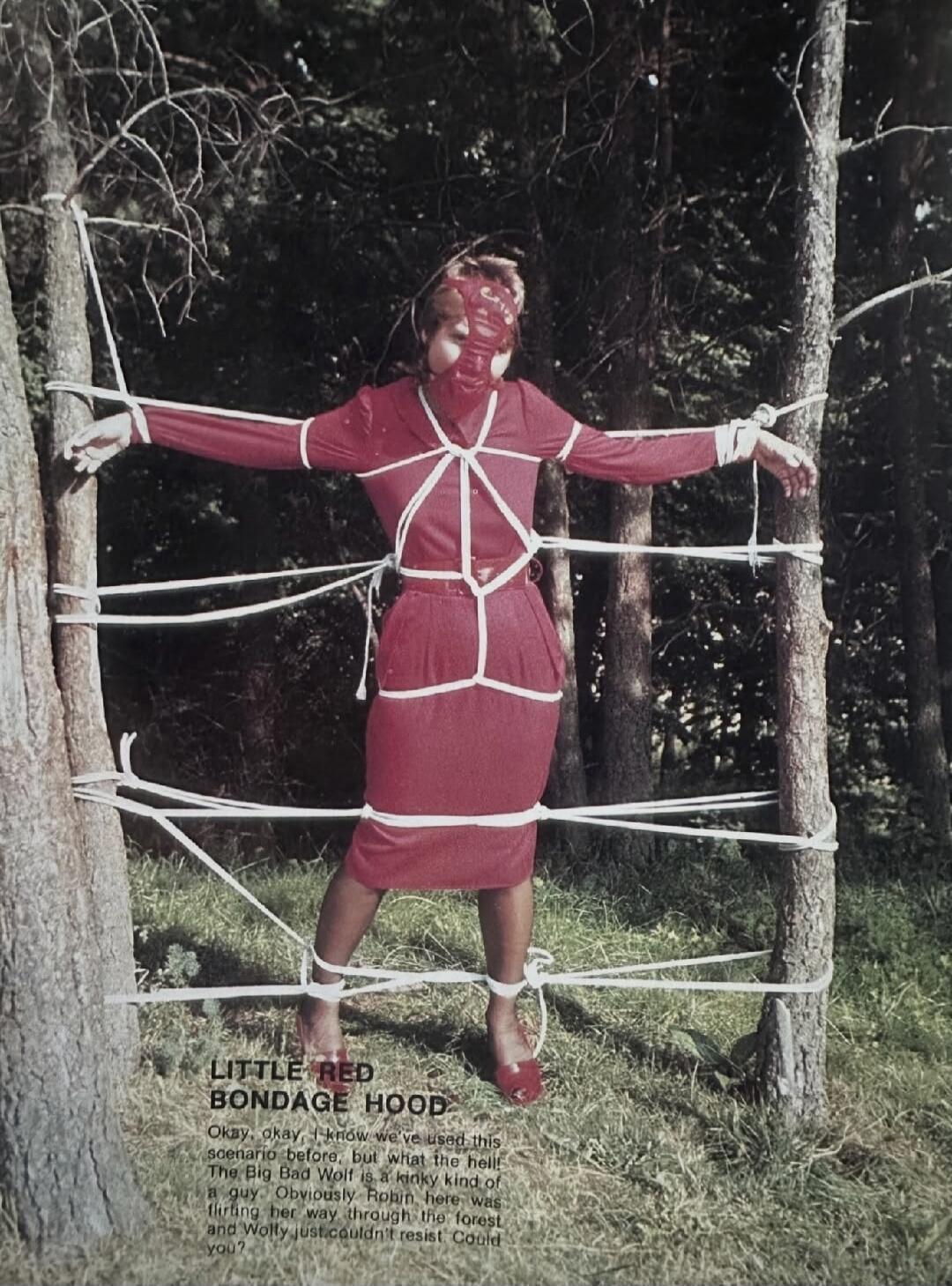 LITTLE RED BONDAGE HOOD Okay, okay, I know we've used this scenario before, but what the hell! The Big Bad Wolf is a kinky kind of a guy. Obviously Robin here was flirting her way through the forest and Wolfy just couldn't resist. Could you?