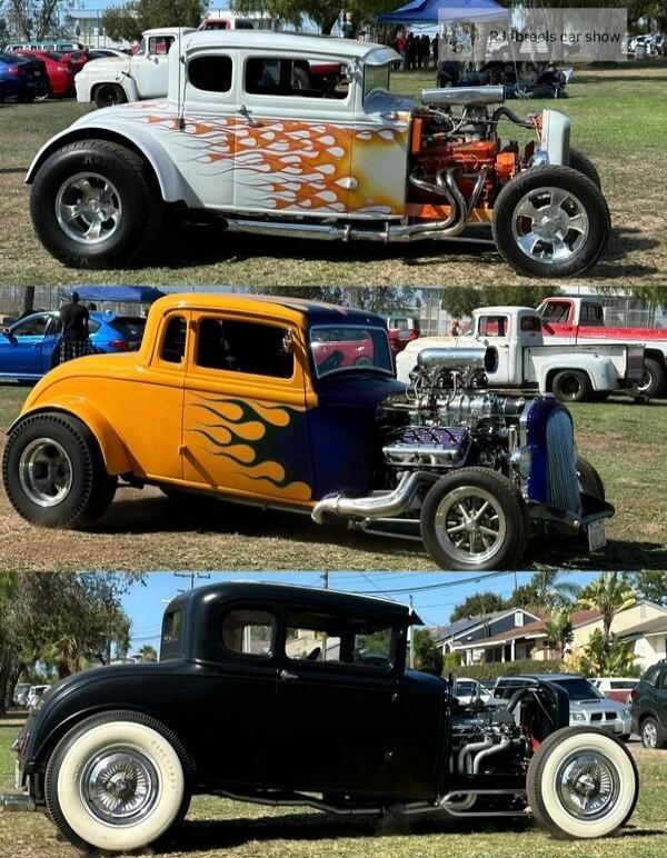 RJ Breels car show. Three custom hot rod cars are displayed outdoors. The top car is white with orange flames, the middle car is yellow and blue with blue flames, and the bottom car is black with white wall tires. All cars feature exposed engines and classic designs.