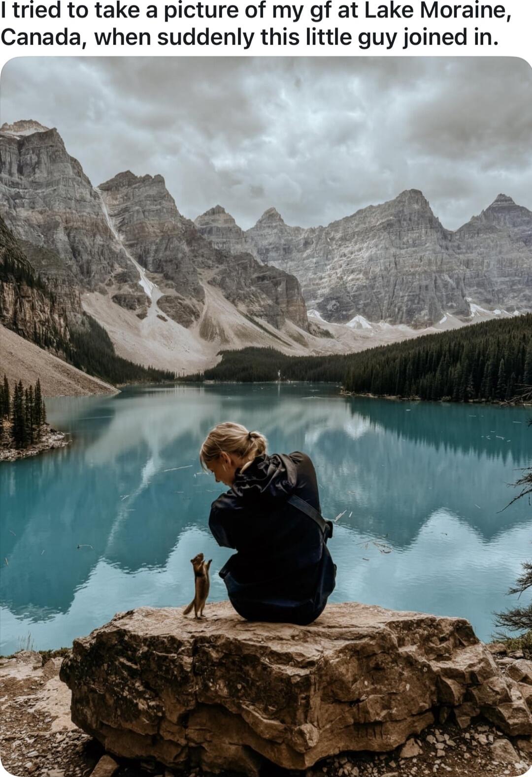 tried to take a picture of my gf at Lake Moraine Canada when suddenly this little guy joined in