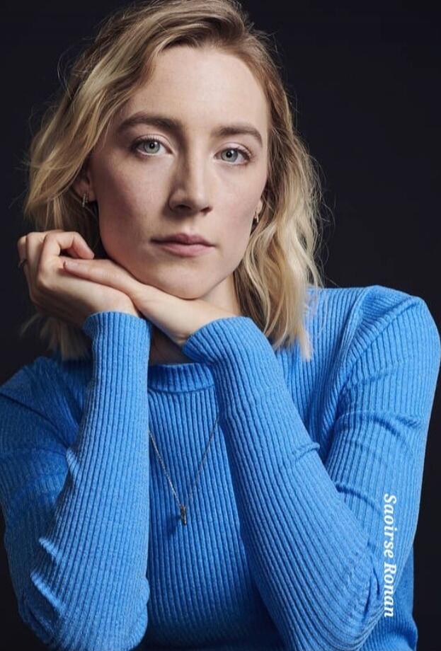 Portrait of a woman in a blue sweater
