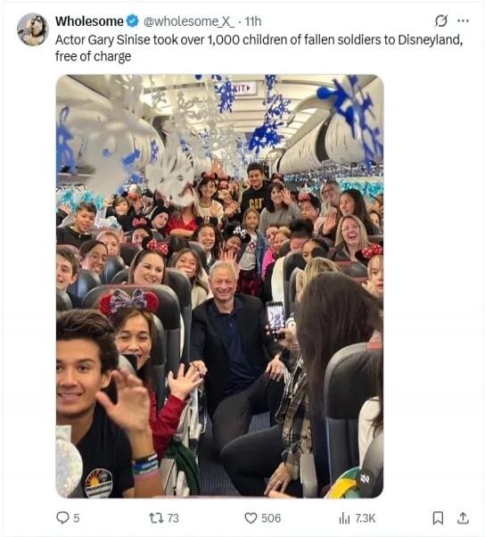 Actor Gary Sinise took over 1,000 children of fallen soldiers to Disneyland, free of charge. The image shows a large group of children and adults, many wearing Mickey Mouse ears, inside an airplane decorated with snowflakes, smiling and looking excited.