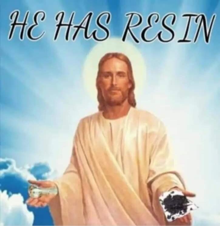 HE HAS RESIN. An image of Jesus Christ with a halo, against a blue sky. He is holding a pipe with residue in one hand and a dark, tar-like substance (resin) on a piece of paper in the other.