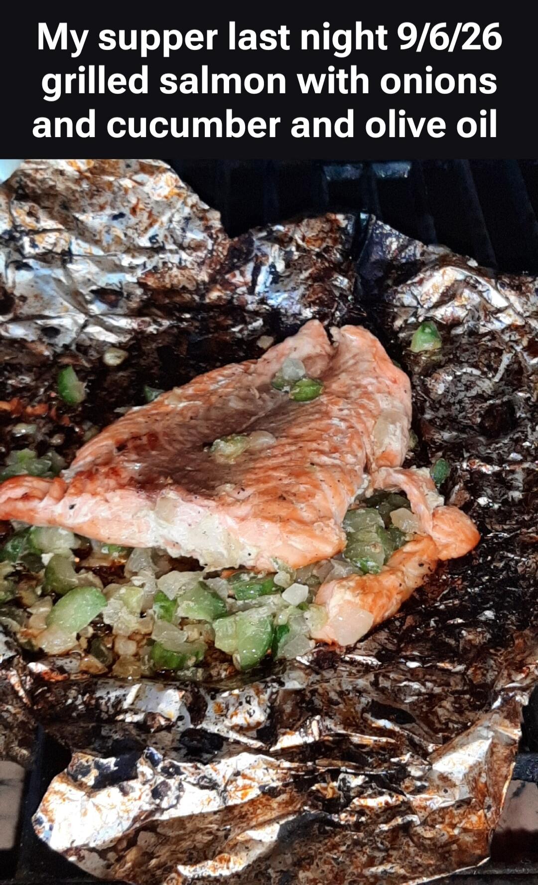 My supper last night 9/6/26 grilled salmon with onions and cucumber and olive oil