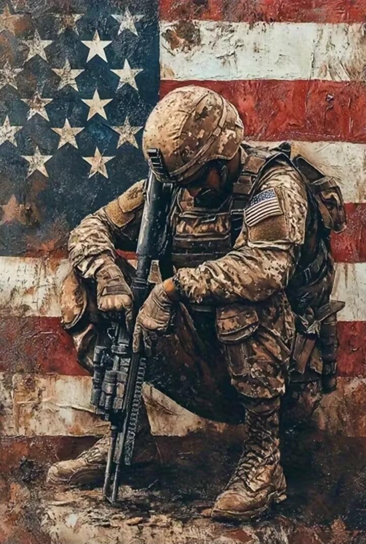 A soldier kneels with a rifle in front of a weathered American flag.