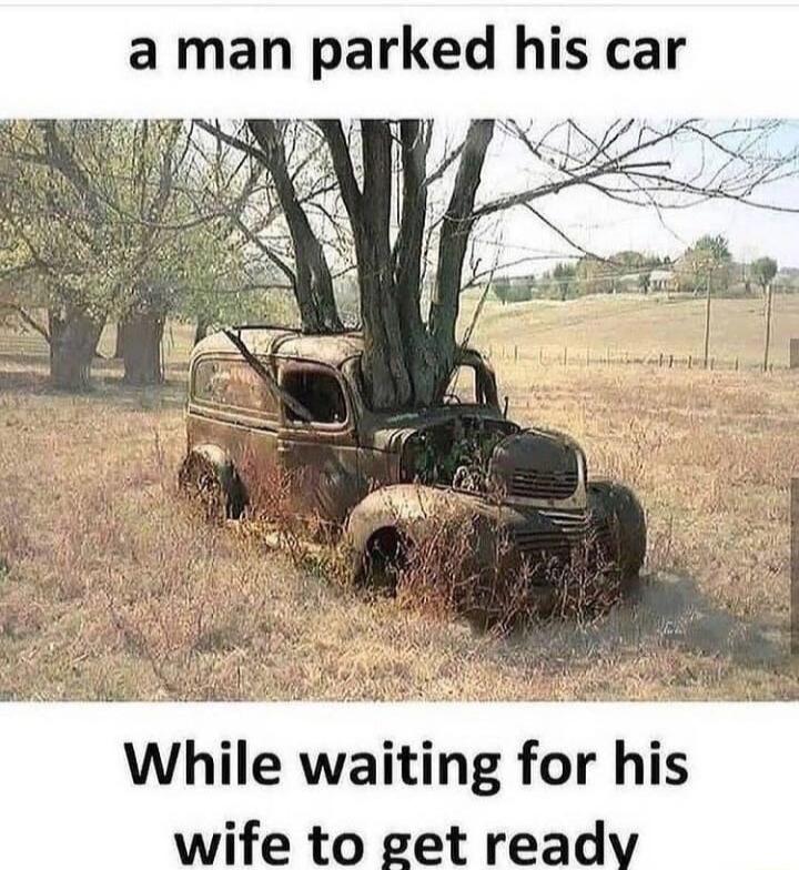 a man parked his car N While waiting for his wife to get ready