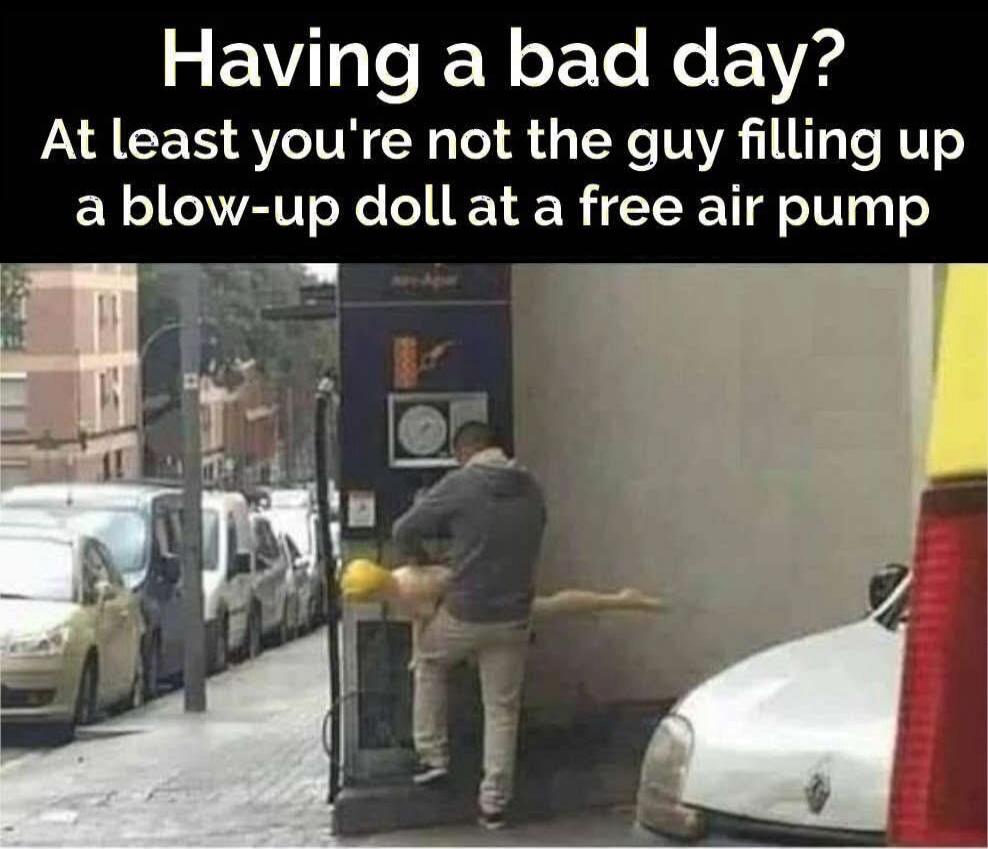 Having a bad day? At least you're not the guy filling up a blow-up doll at a free air pump