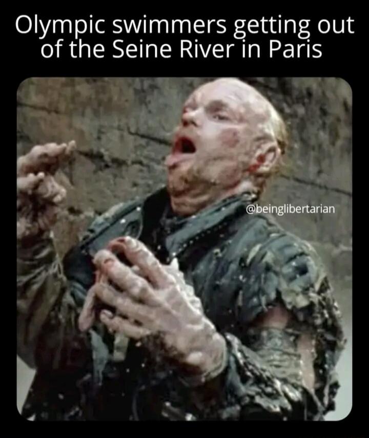 Olympic swimmers getting out of the Seine River in Paris