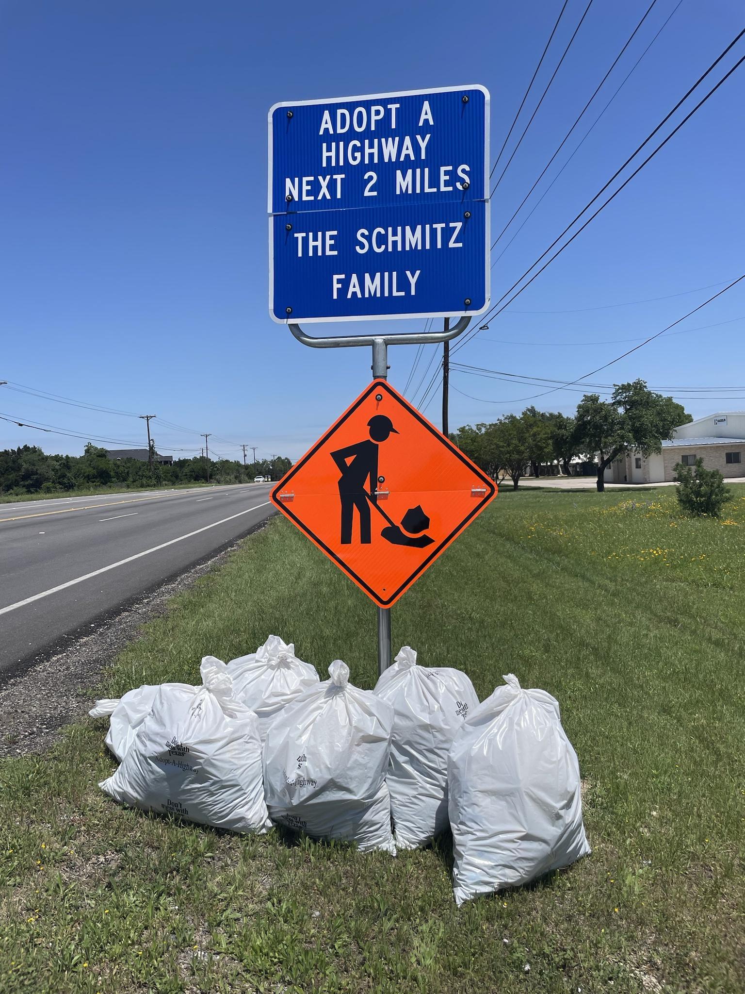 ADOPT A HIGHWAY NEXT 2 MILES THE SCHMITZ FAMILY
