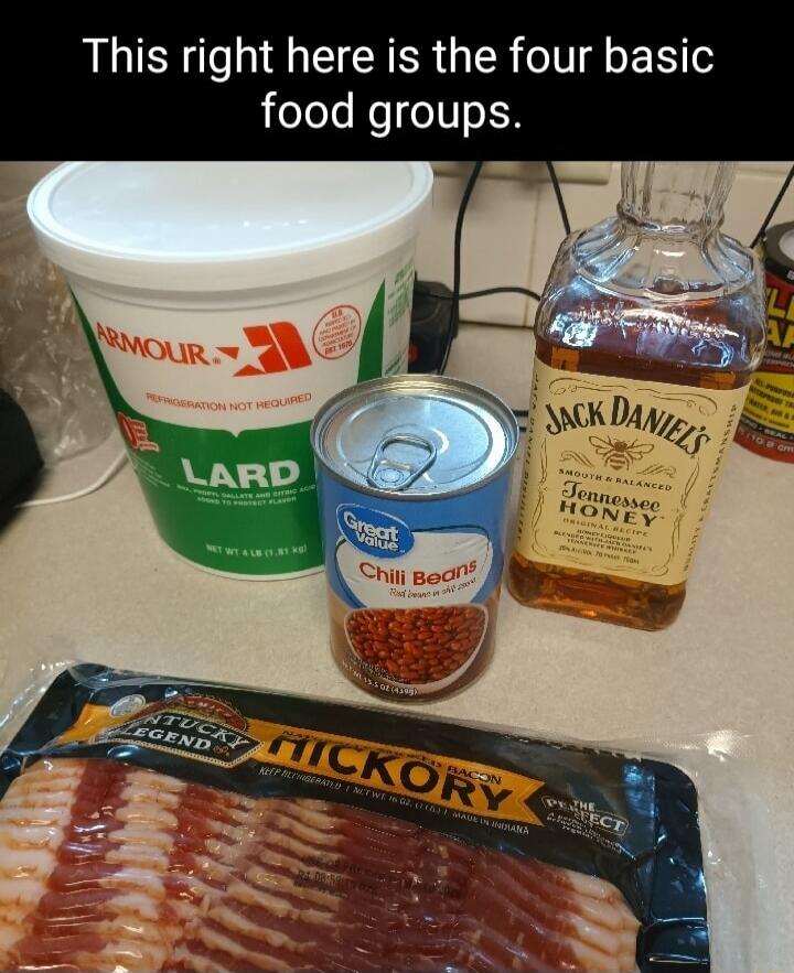 This right here is the four basic food groups. The image displays a tub of Armour Lard, a can of Great Value Chili Beans, a bottle of Jack Daniel's Tennessee Honey whiskey, and a package of Hickory Bacon.