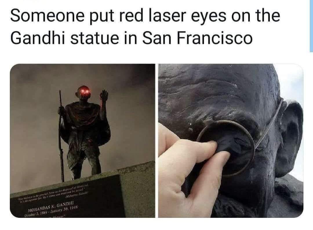 Someone put red laser eyes on the Gandhi statue in San Francisco