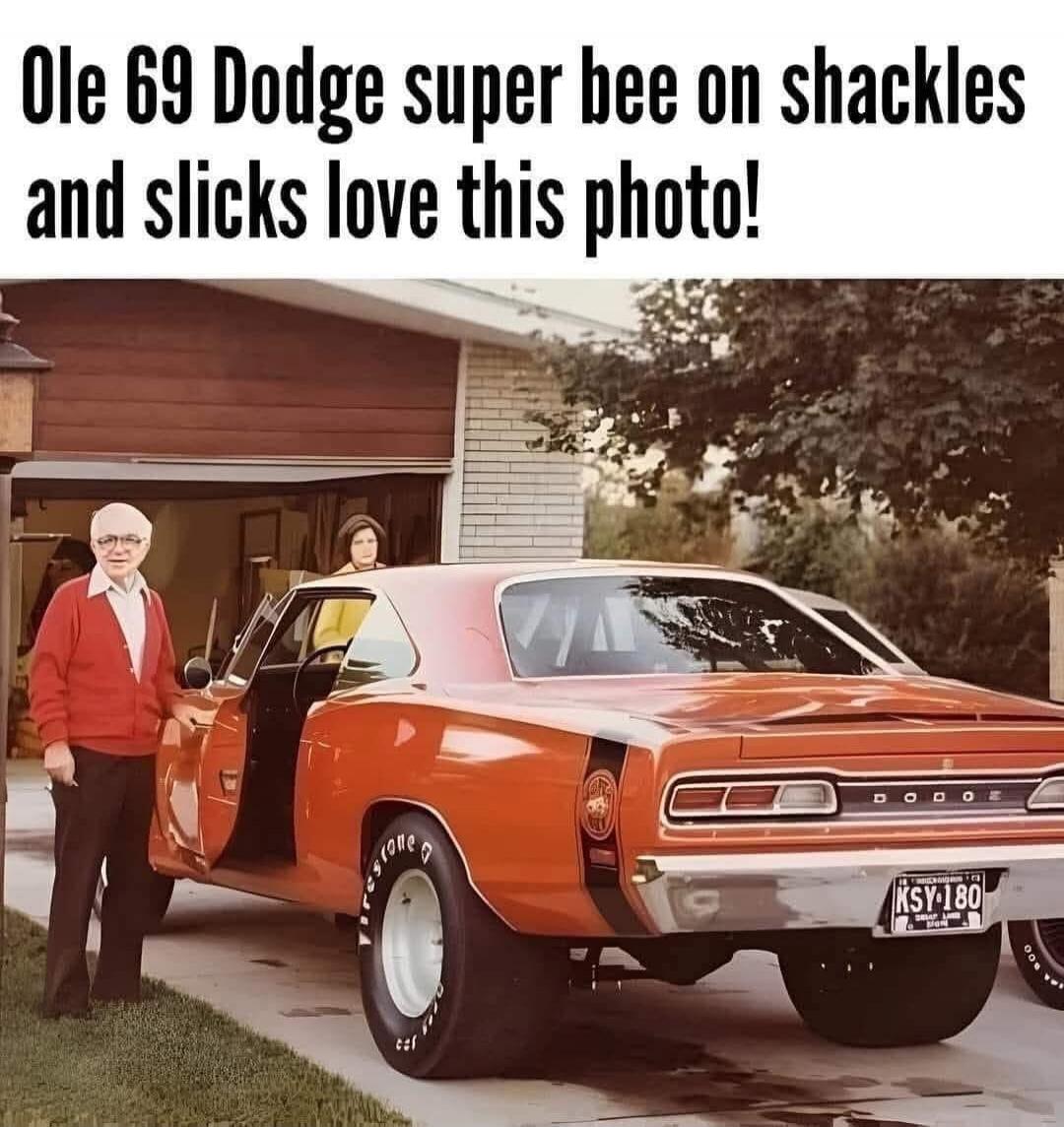 Ole 69 Dodge super bee on shackles and slicks love this photo!
