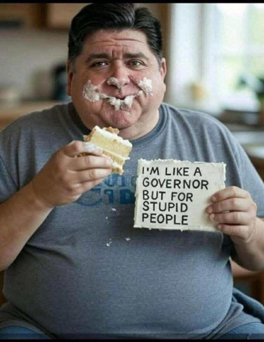 A man with cake frosting on his face is eating a piece of cake and holding a sign that reads: 'I'M LIKE A GOVERNOR BUT FOR STUPID PEOPLE'.