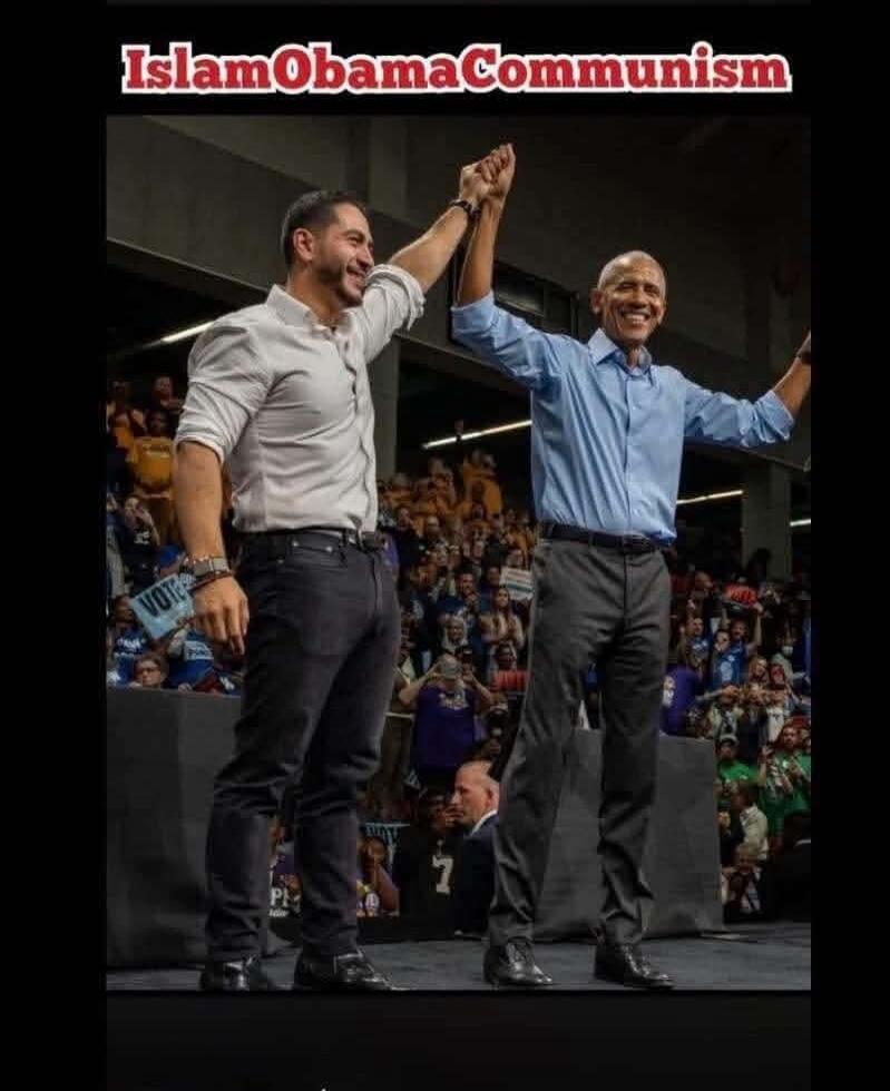 IslamObamaCommunism. Two men, one of whom is Barack Obama, are on a stage, raising their clasped hands in front of a crowd. A sign with 'VOTE' is visible in the background.