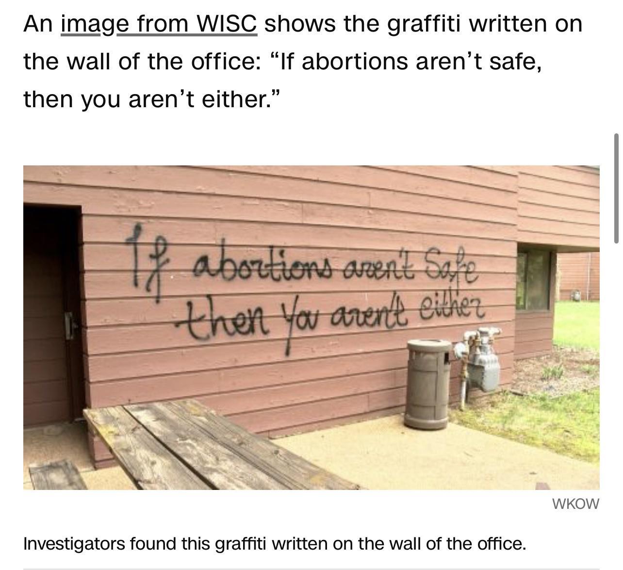 An image from WISC shows the graffiti written on the wall of the office If abortions arent safe then you arent either WKOW Investigators found this graffiti written on the wall of the office