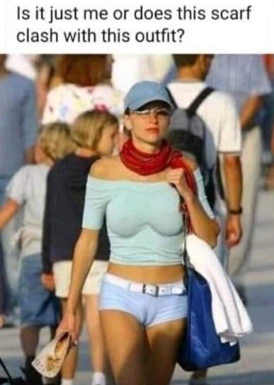 Is it just me or does this scarf clash with this outfit