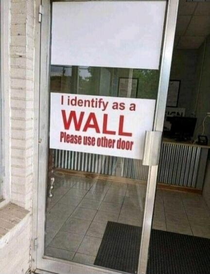I identify as a WALL Please use other door