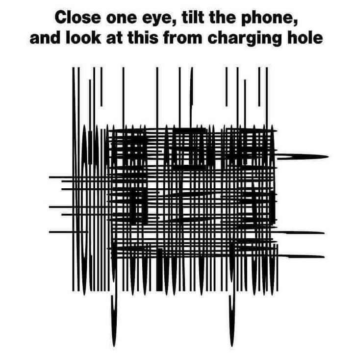 Close one eye tilt the phone and look at this from charging hole