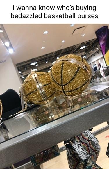 I wanna know whos buying bedazzled basketball purses