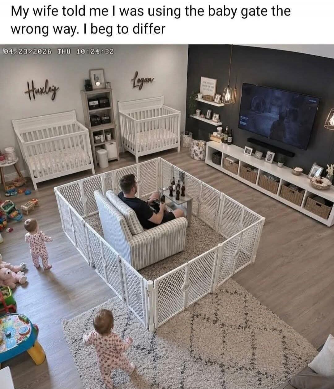 My wife told me I was using the baby gate the wrong way. I beg to differ. 04/23/2026 THU 10:24:32. Huxley. Logan.