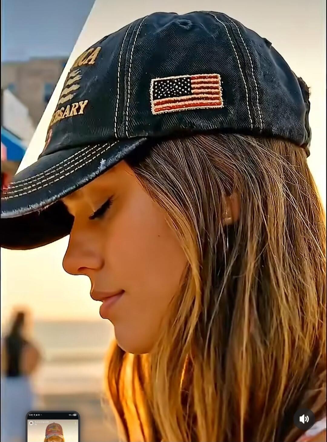 Cap with American flag patch on a dark denim hat worn by a woman