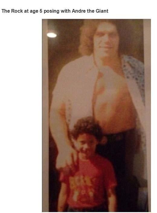 The Rock at age 5 posing with Andre the Giant