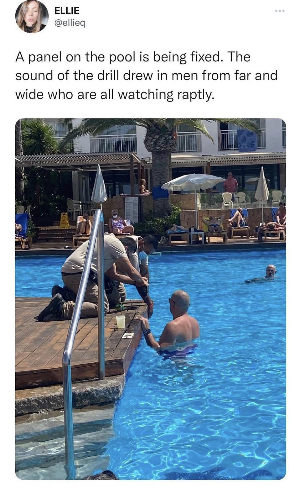 A panel on the pool is being fixed The sound of the drill drew in men from far and wide who are all watching raptly