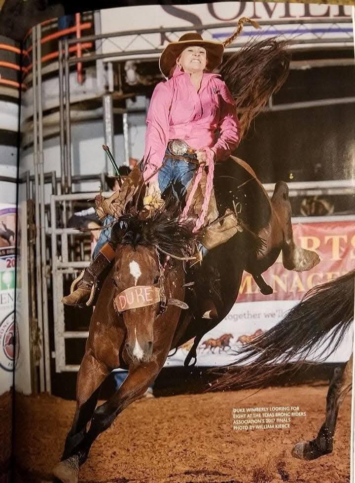 DUKE WIMBERLY LOOKING FOR EIGHT AT THE TEXAS BRONC RIDERS ASSOCIATION'S 2017 FINALS. PHOTO BY WILLIAM KIERCE. DUKE. SPORTS MANAGEMENT. together we'll. EN. 20.