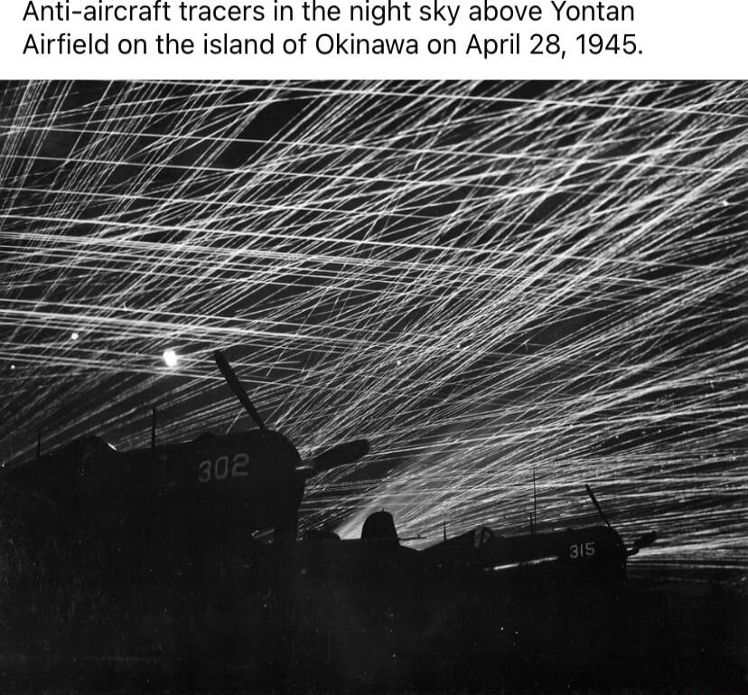 Anti aircratt tracers In the night sky above Yontan Airfield on the island of Okin on April 945 e